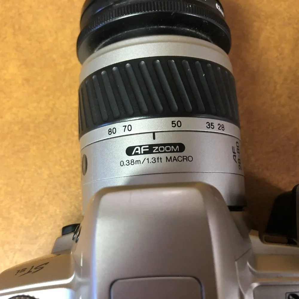 Minolta Maxxum STsi 35mm Film Camera with Minolta 28-80mm AF Zoom Lens